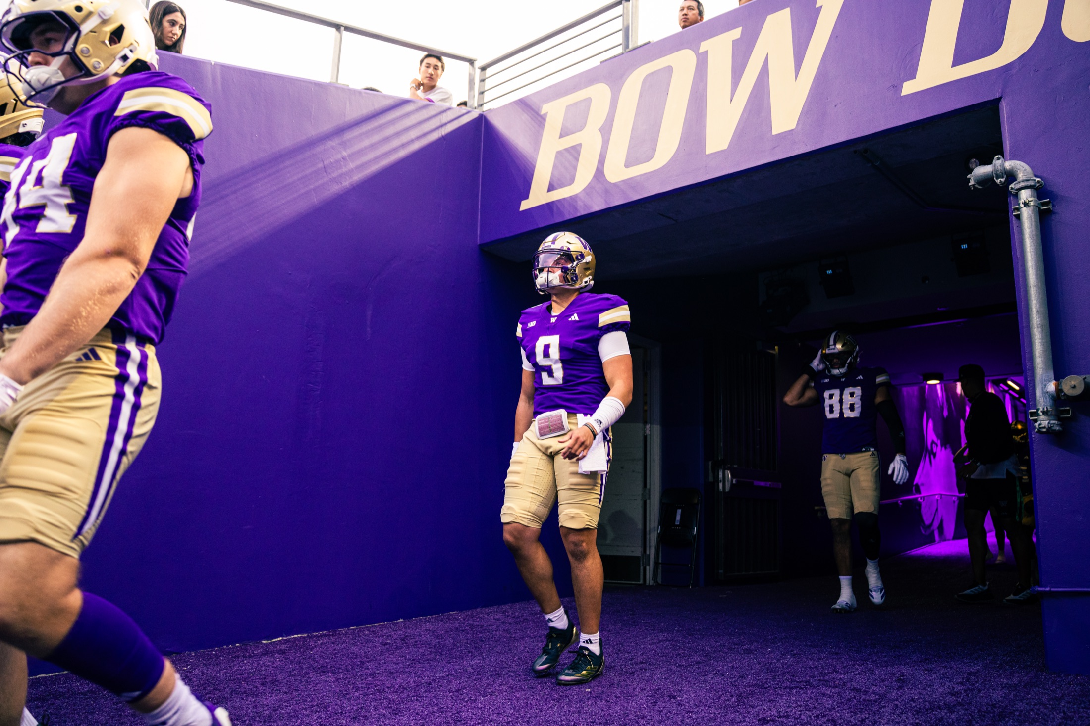 Washington quarterback number nine waiting at the mouth of the tunnel